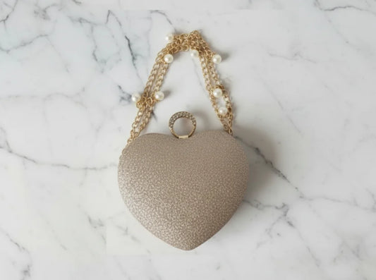 golden mini heart clutch