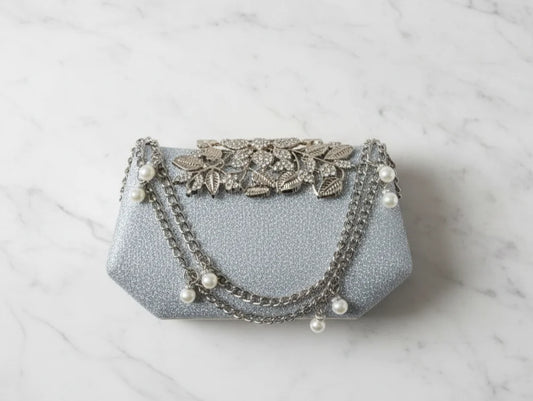 Silver brooch clutch
