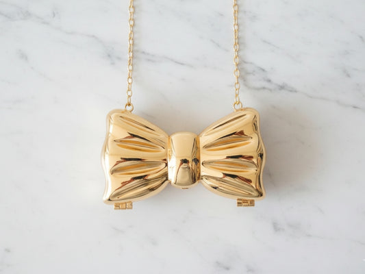 Metallic Golden Mini Bow Clutch